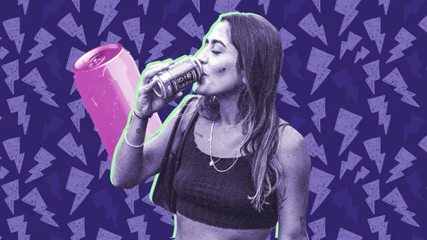 woman drinking an energy drink