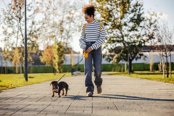 woman walking her dog